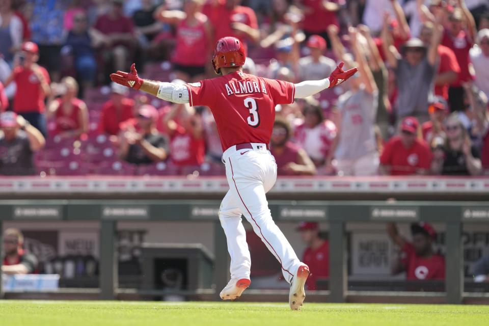 Cincinnati Reds' Albert Almora Jr. (3) reacts after hitting a winning single to defeat the Atlanta Braves in the ninth inning of a baseball game Sunday, July 3, 2022, in Cincinnati.