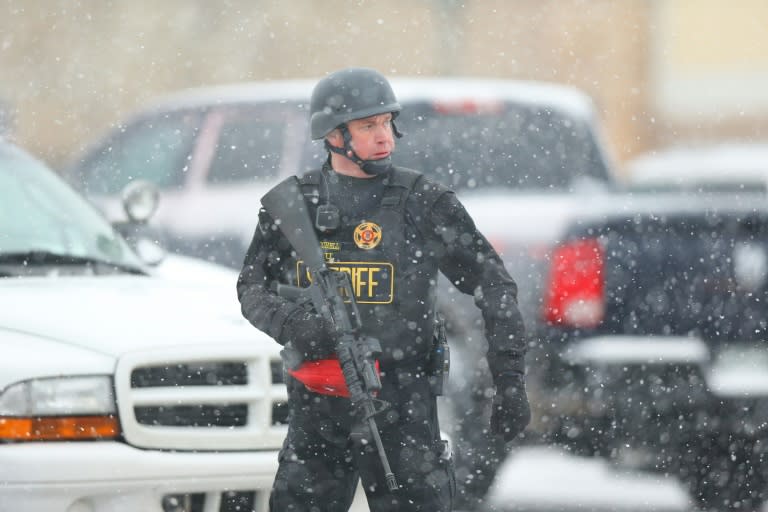 A member of the Colorado Springs sheriff's department secures the scene at a Planned Parenthood office on November 27, 2015