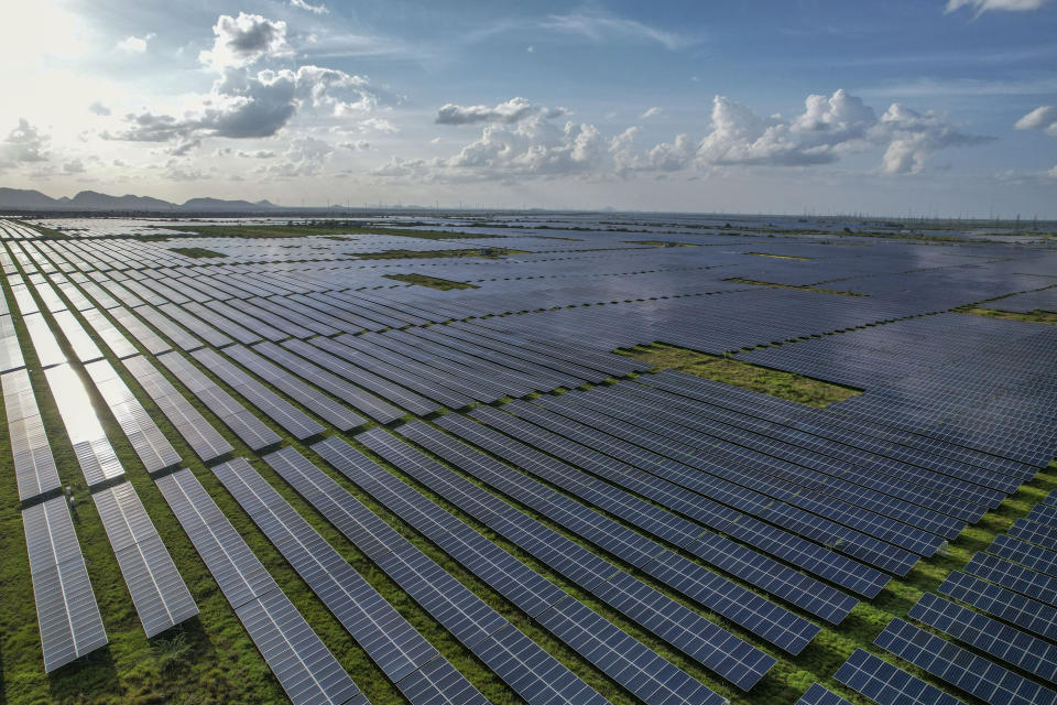 FILE - A solar power plant works in the Pavagada Tumkur district, in the southern Indian state of Karnataka, India, Sept. 15, 2022. The past year saw major governments around the world green lighting ambitious renewable energy policies. (AP Photo/Rafiq Maqbool, File)