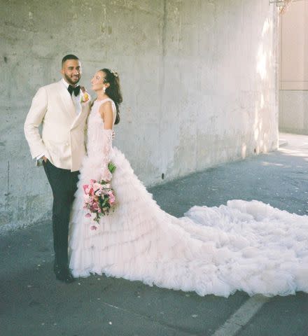 <p><a href="https://www.jasmyn.com.au/" data-component="link" data-source="inlineLink" data-type="externalLink" data-ordinal="1" rel="nofollow">Wedding Dresses - Jasmyn</a></p> From Right: Jasmine Fernandez and her husband on their wedding day
