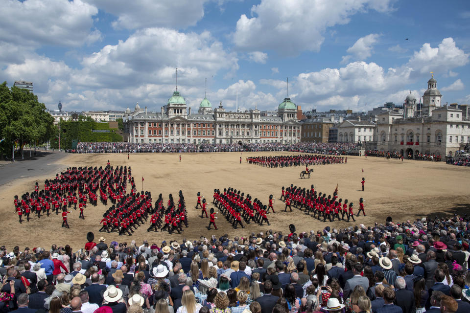 Troops march on Horseguards Parade during The Trooping of the Color in London, Thursday June 2, 2022, on the first of four days of celebrations to mark Queen Elizabeth II's Platinum Jubilee. (Roland Hoskins/Pool via AP)