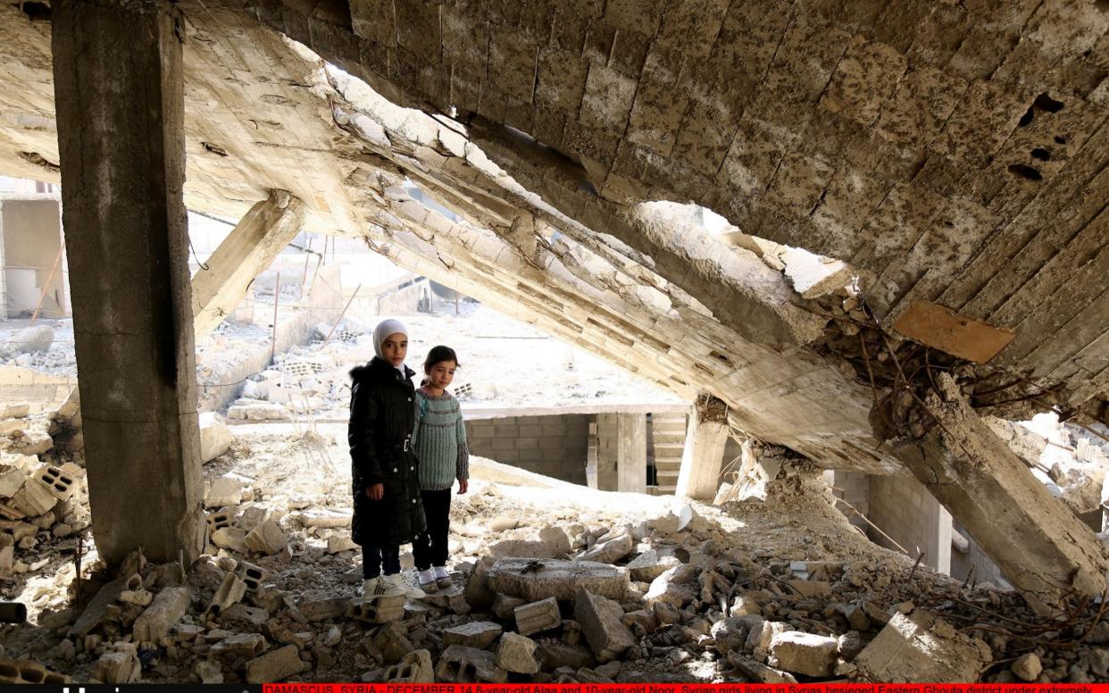 Two Syrian girls in besieged Eastern Ghouta - Anadolu