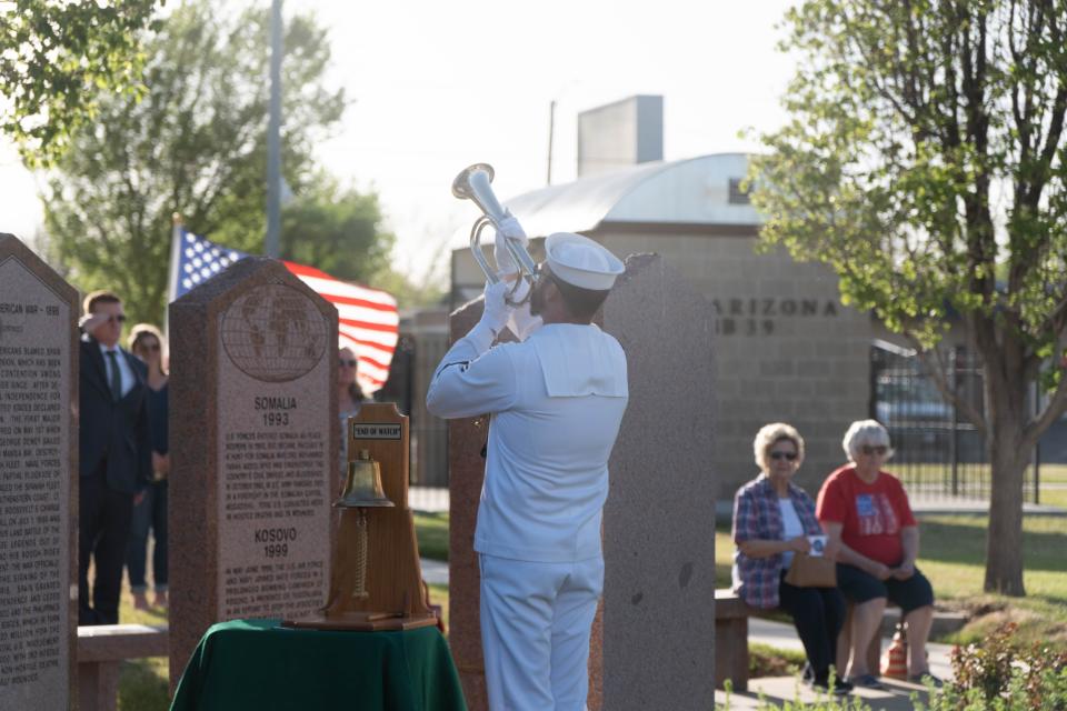 Taps is bugled Wednesday evening during the Missing in America's Project ceremony honoring three unclaimed veterans at the Texas Panhandle War Memorial Center in Amarillo.