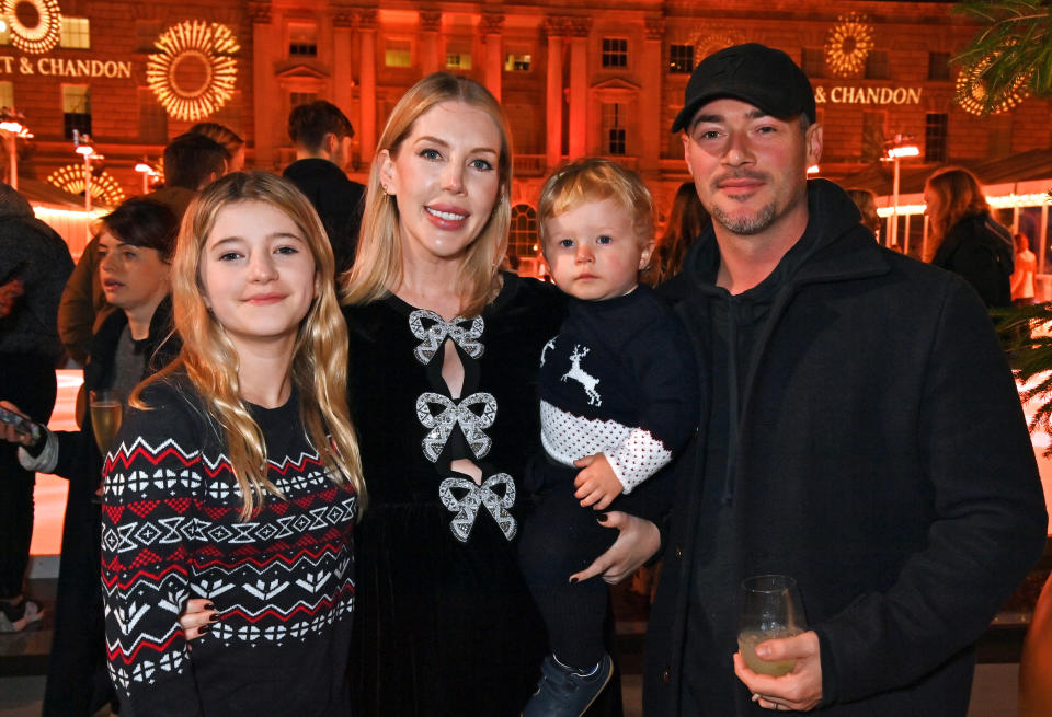 Katherine Ryan (2L) and Bobby Kootstra (R) pose with children Violet and Fred at Skate at Somerset House with Mo&#xeb;t & Chandon at Somerset House on November 15, 2022 in London, England. (Photo by David M. Benett/Dave Benett/Getty Images for Somerset House Trust/Mo&#xeb;t & Chandon)