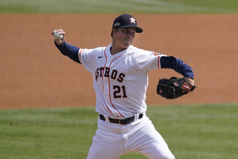 Houston Astros' Zack Greinke pitches against the Oakland Athletics during the first inning of Game 4 of a baseball American League Division Series in Los Angeles, Thursday, Oct. 8, 2020. (AP Photo/Ashley Landis)