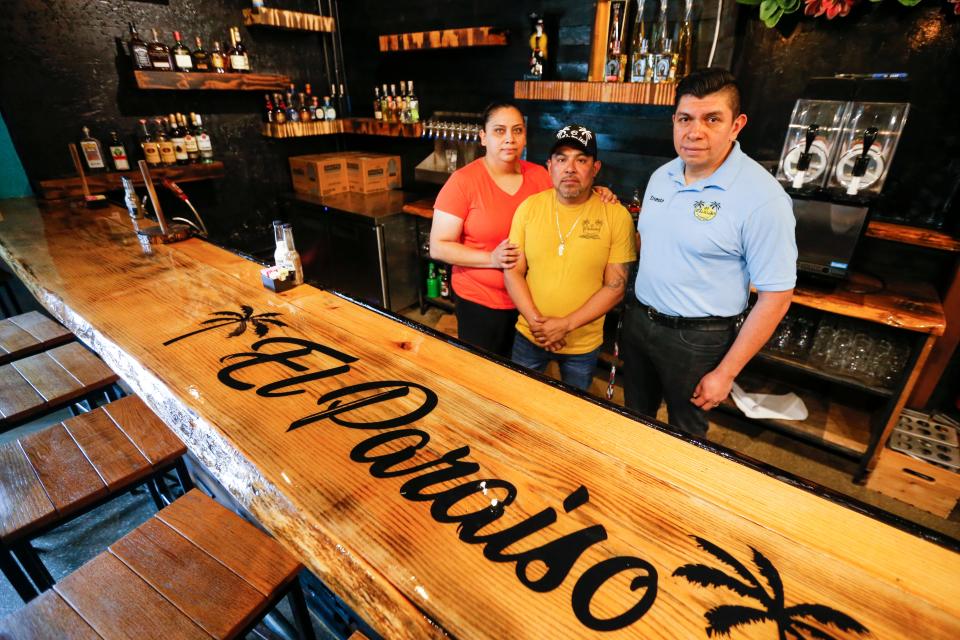 El Paraiso owners Flor Aragon (left), Mario Cruz (center), and manager Ernesto Torres.