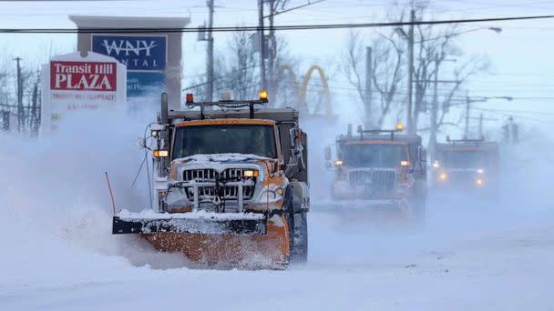 PHOTO: Snow plows clear the roads following a winter storm that hit the Buffalo region in Lancaster, New York, December 25, 2022. (Brendan Mcdermid/Reuters)