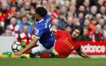 Britain Soccer Football - Liverpool v Everton - Premier League - Anfield - 1/4/17 Everton's Ashley Williams fouls Liverpool's Emre Can Reuters / Phil Noble Livepic