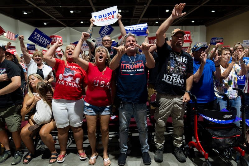 Supporters cheer as they listen to Republican vice presidential candidate Sen. JD Vance, R-Ohio, during a campaign event in Reno, Nev., Tuesday, July 30, 2024. | Jae C. Hong