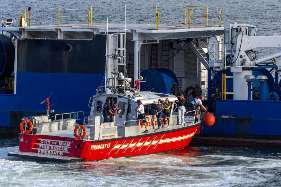 A City of Miami Fire-Rescue vessel motors next to a vessel to transport sex trafficking victims recovered by a rescue team during a South Florida Public Safety Regional Assets in Action Demonstration showcasing an active threat response incident in Biscayne Bay as part of the annual 2024 National Homeland Security Conference at PortMiami, Terminal J on Wednesday, July 24, 2024, in Miami, Fla.