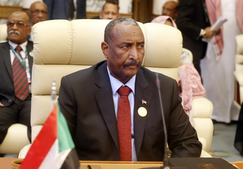 FILE - In this May 30, 2019 file photo, Abdel-Fattah Burhan, the head of Sudan's ruling military council, attends an emergency summit of Gulf Arab leaders in Mecca, Saudi Arabia. Sudan’s military council is urging protest leaders to resume negotiations on the transition of power, but says talks “should not be preconditioned.” Gen. Abdel-Fattah Burhan, head of the council, said Wednesday, June 19, 2019, that the council has no preconditions for returning to the negotiating table with the Forces for Declaration of Freedom and Change, which has represented protesters. (AP Photo/Amr Nabil, File)