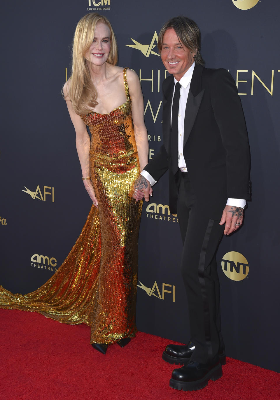 Nicole Kidman, left, and Keith Urban arrive at the 49th AFI Life Achievement Award honoring Kidman on Saturday, April 27, 2024, at the Dolby Theatre in Los Angeles. (Photo by Jordan Strauss/Invision/AP)