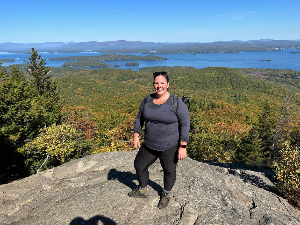 Kelly Burch hiking on a sunny day