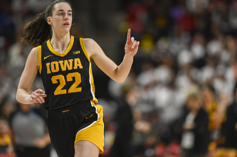 Feb 3, 2024; College Park, Maryland, USA; Iowa Hawkeyes guard Caitlin Clark (22) reacts after making a three point basket during the second half against the Maryland Terrapins at Xfinity Center. Tommy Gilligan-USA TODAY Sports