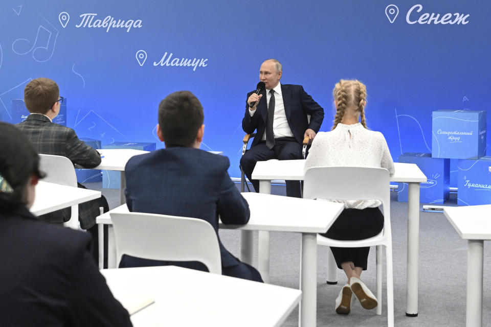 Russian President Vladimir Putin holds the Talking of What Matters open lesson, as part of the Russia - Land of Opportunities platform projects, at the Senezh Management Lab in Solnechnogorsk, Moscow region, Russia, Friday, Sept. 1, 2023. (Ekaterina Chesnokova, Sputnik, Kremlin Pool Photo via AP)