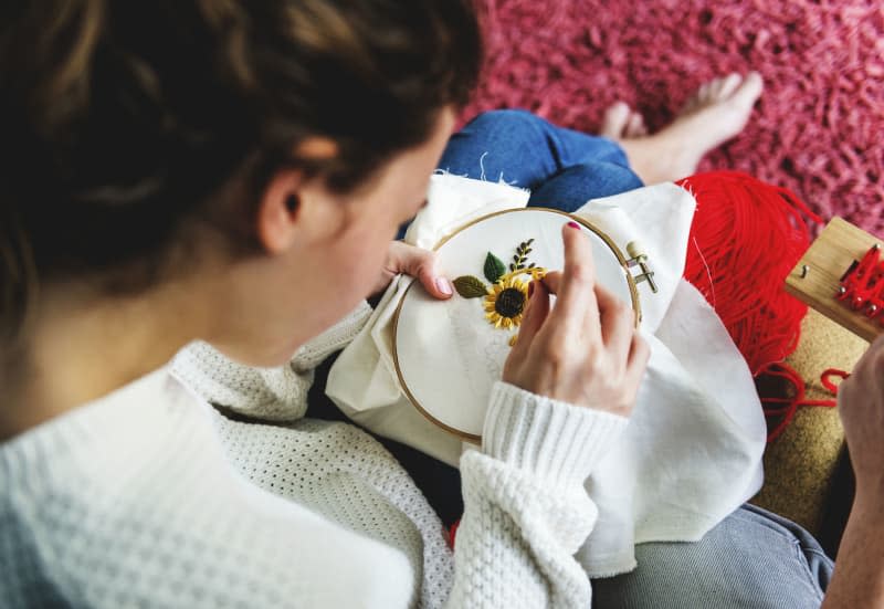 Young girl doing some needlework