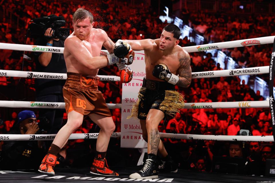 LAS VEGAS, NEVADA - SEPTEMBER 14: Edgar Berlanga (R) punches WBC/WBA/WBO super middleweight champion Canelo Alvarez during the sixth round of a title fight at T-Mobile Arena on September 14, 2024 in Las Vegas, Nevada. (Photo by Steve Marcus/Getty Images)