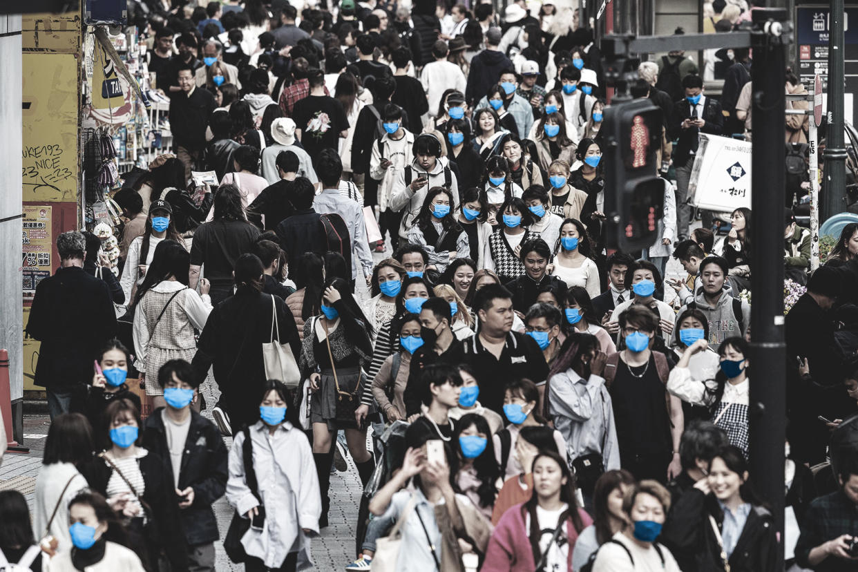 Shibuya Tokyo city crowd mask focus RICHARD A. BROOKS/AFP via Getty Images