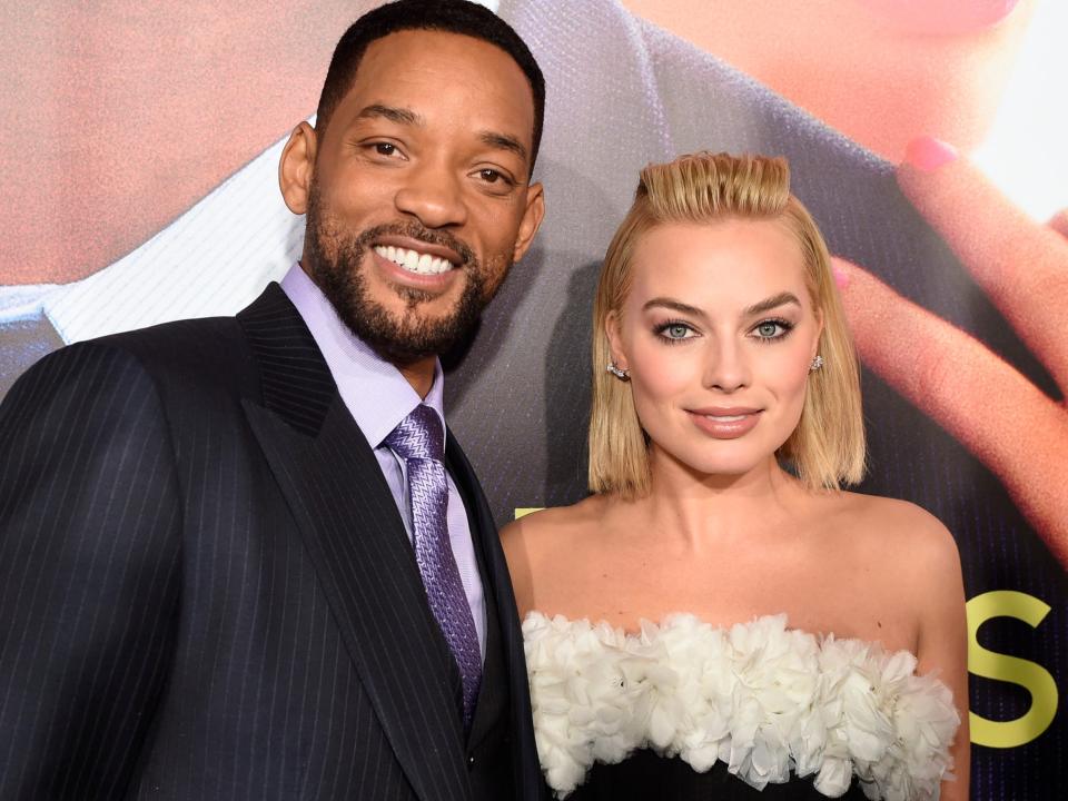 Will Smith, left, and Margot Robbie arrive at the world premiere of "Focus" at the TCL Chinese Theatre on Tuesday, Feb. 24, 2015, in Los Angeles.