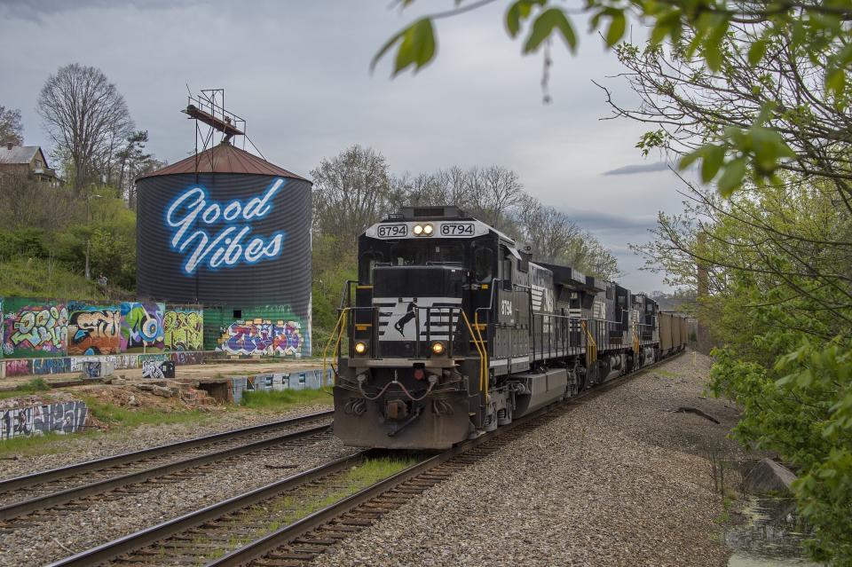 A Norfolk Southern coal train passes through the River Arts District in 2016.