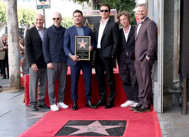 <p>Leon Bennett/Getty</p> Steve Nissen, Sean Durkin, Zac Efron, Miles Teller, Jeremy Allen White and Marc Malkin on Dec. 11, 2023