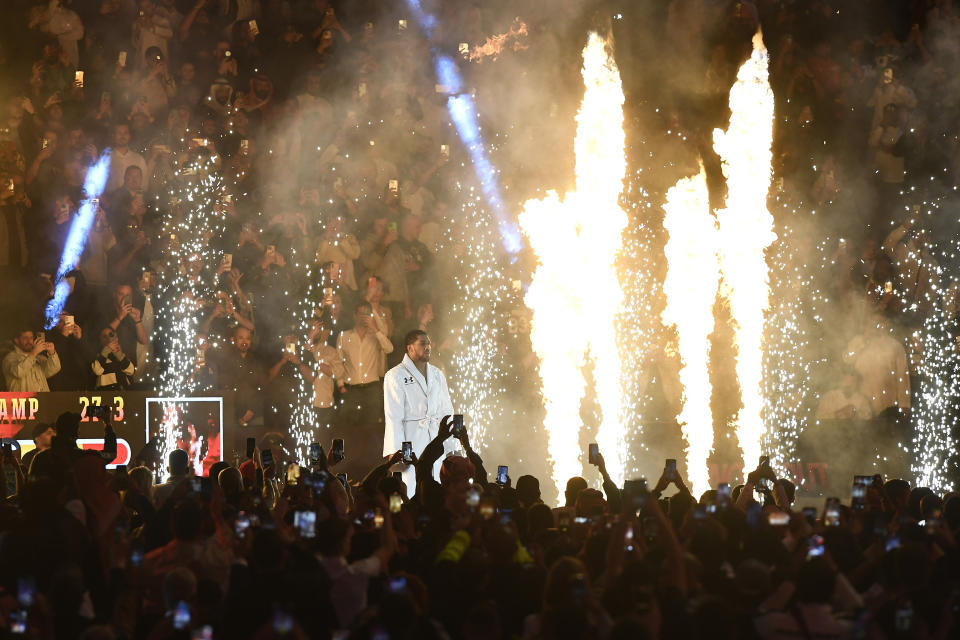 British former world champion Anthony Joshua, arrives to fight with MMA fighter Francis Ngannou during the heavyweight boxing showdown at Kingdom Arena in Riyadh, Saudi Arabia, Saturday, March 9, 2024. (AP Photo)