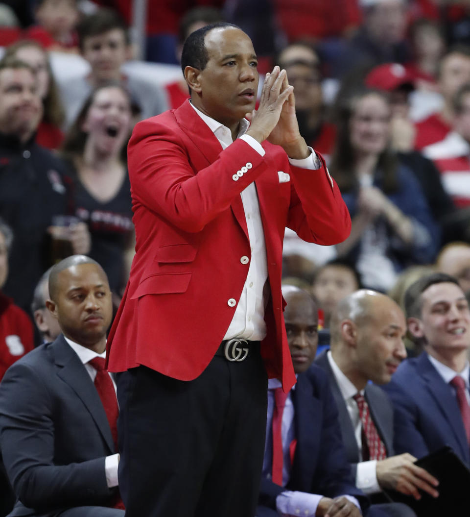 North Carolina State coach Kevin Keatts watches during the first half of the team's NCAA college basketball game against Wake Forest in Raleigh, N.C., Friday, March 6, 2020. (Ethan Hyman/The News & Observer via AP)