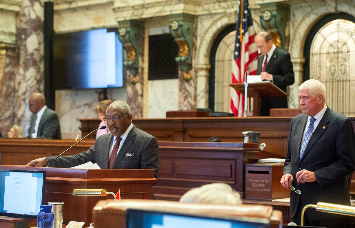 Sen. Kevin Blackwell, R-Southaven, right, listens as Sen. John Horhn, D-Jackson, right, proposes an amendment to the Medicaid expansion bill before the Mississippi Senate at the state Capitol in Jackson, Miss., on Wednesday, March 28, 2024. The Senate passed its version of Medicaid expansion.