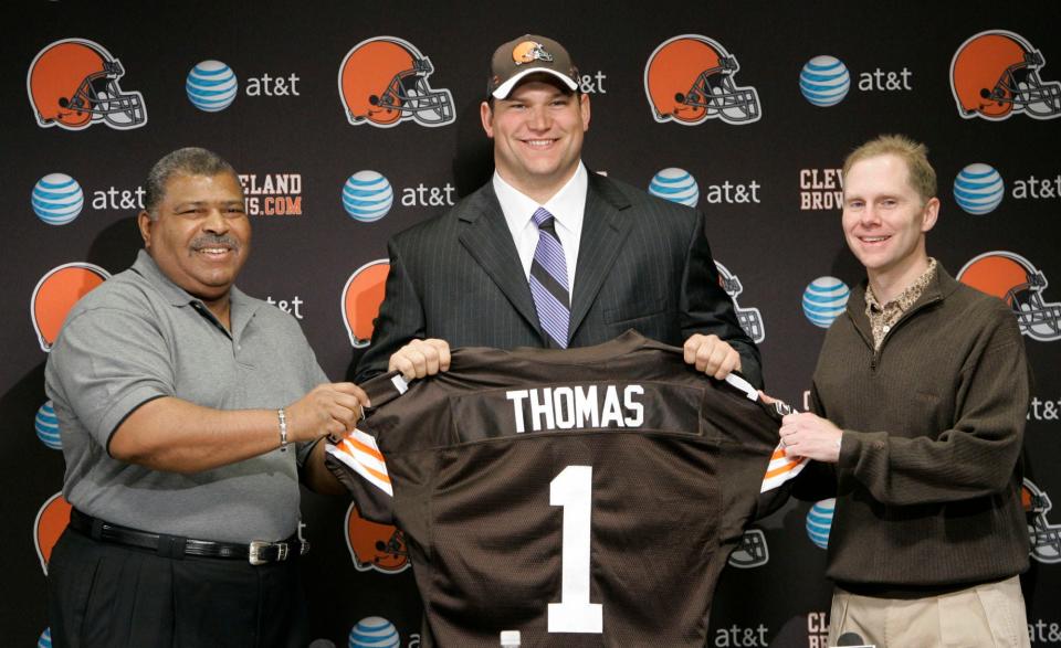 Browns first-round draft pick Joe Thomas is flanked by coach Romeo Crennel, left, and general manager Phil Savage during a news conference on April 29, 2007, in Berea.