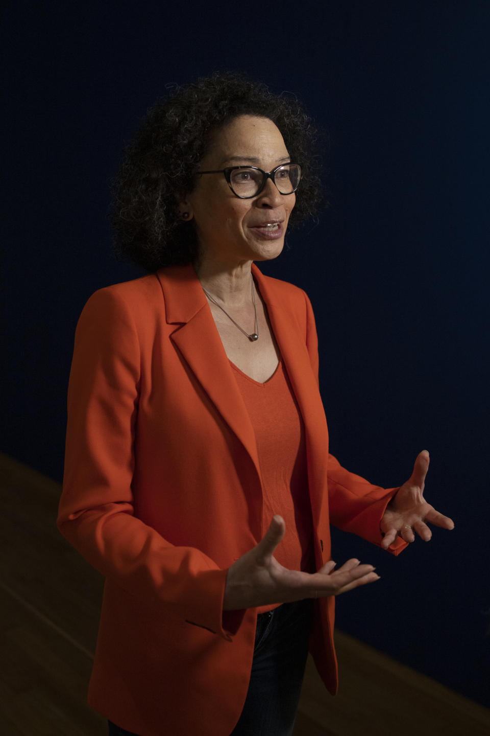 Curator and head of the history department of the museum, Valika Smeulders is interviewed at the Slavery exhibition Rijksmuseum in Amsterdam, Netherlands, Monday, May 17, 2021. The stark contrast between finery and brutality, wealth and inhumanity is a recurring pattern at the museum's unflinching new exhibition titled, simply, "Slavery", that examines the history of Dutch involvement in the international slave trade. (AP Photo/Peter Dejong)