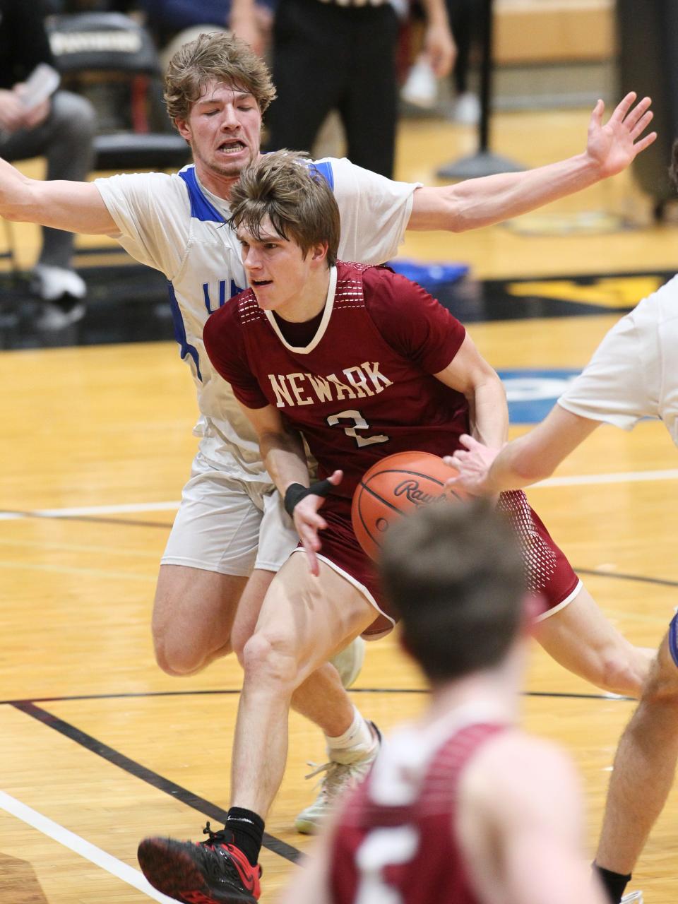 Newark's Drew Oberholtzer drives to the basket against Olentangy Liberty.