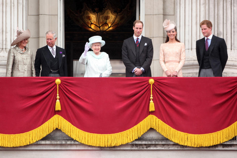 The Duchess of Cornwall, Prince Charles, Queen Elizabeth, Prince William, the Duke of Cambridge and Duchess of Cambridge and Prince Harry appear on the balcony at Buckingham Palace following Tuesday's royal carriage procession.