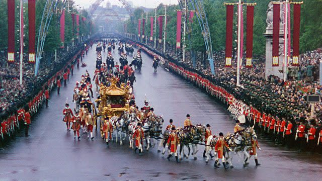 The Queen rides in the Gold State Coach after her coronation (BBC/PA)