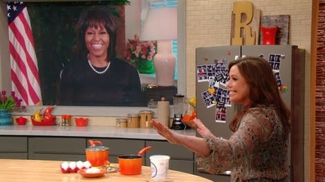 The first lady tells Rachael Ray that the bangs were part of her mid-life crisis. (Photo: CBS)