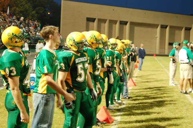 The Pratt Greenbacks still compete in all green uniforms ... and a frog on the helmet — Pratt USD 382