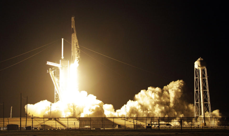 A SpaceX Falcon 9 rocket with a demo Crew Dragon spacecraft lifts off from pad 39A on an un-crewed test flight to the International Space Station at the Kennedy Space Center in Cape Canaveral, Fla., Saturday, March 2, 2019. (AP Photo/Terry Renna)