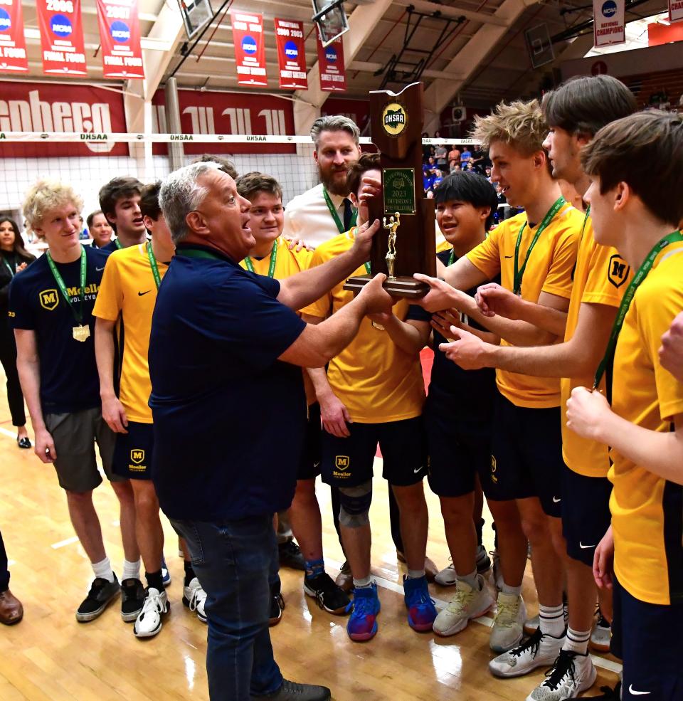 The state championship trophy is awarded to the Moeller Crusaders at the inaugural OHSAA Division I Boys Volleyball State Championship, May 28, 2023.