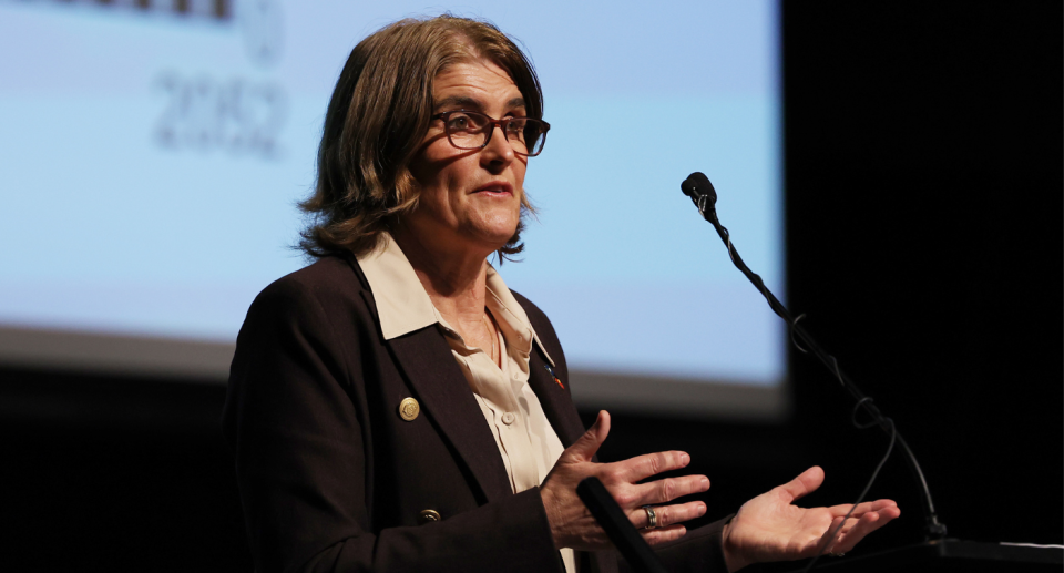 Reserve Bank governor Michelle Bullock gestures while discussing inflation and interest rates.