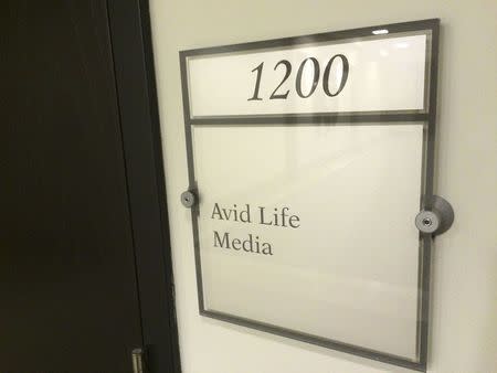 A sign displays the name of Avid Life Media, the parent company of AshleyMadison.com, outside a locked suite in an office building in Toronto, Canada July 20, 2015. REUTERS/Hyungwon Kang