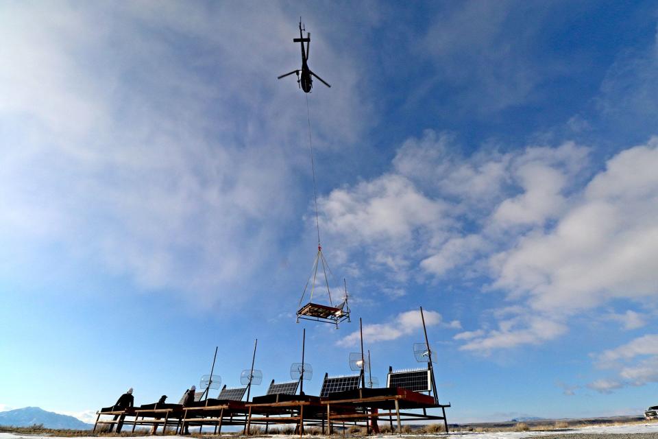 The surface detectors at Telescope Array in Utah deployed by a helicopter. Surface detectors give researchers information about each cosmic ray to reveal the primary particle’s energy.