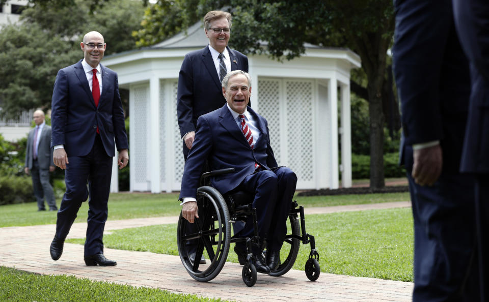 Gov. Greg Abbott, right, Lt. Governor Dan Patrick, center, and Speaker of the House Dennis Bonnen, left, arrive for a joint news conference to discuss teacher pay and school finance at the Texas Governor's Mansion in Austin, Texas, Thursday, May 23, 2019, in Austin. (AP Photo/Eric Gay)