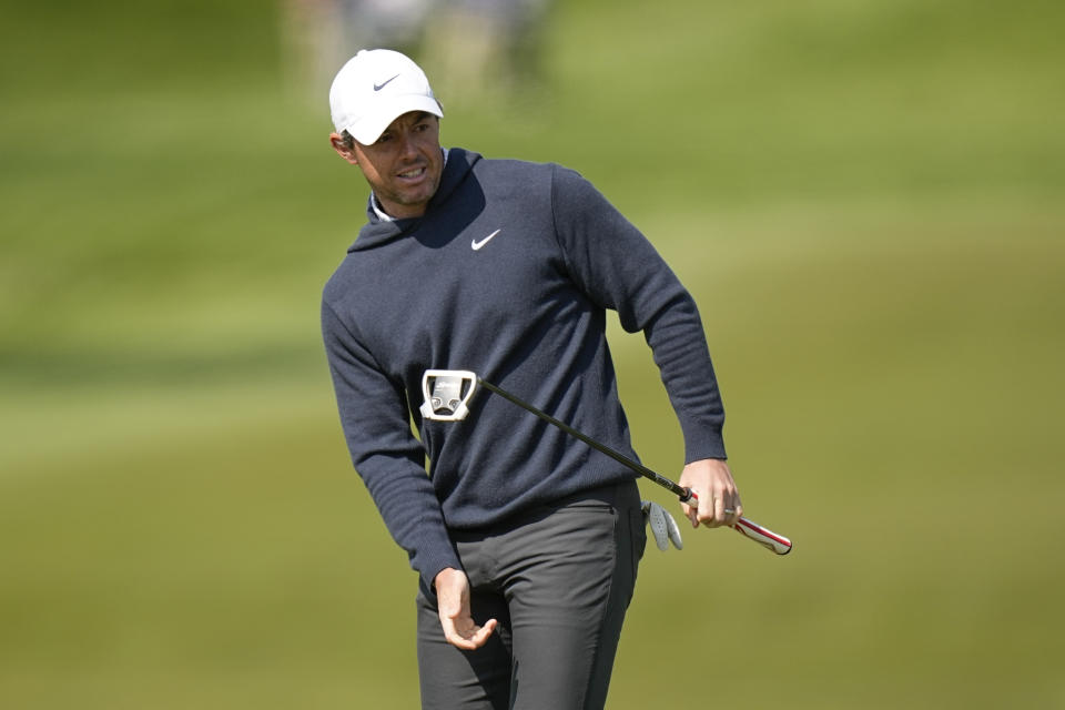 Rory McIlroy, of Northern Ireland, reacts after missing a putt on the 10th hole during the first round of the PGA Championship golf tournament at Oak Hill Country Club on Thursday, May 18, 2023, in Pittsford, N.Y. (AP Photo/Eric Gay)