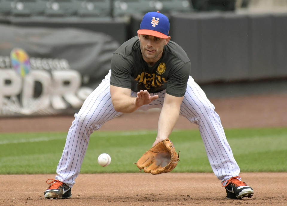 New York Mets' David Wright fields a ground ball during a simulated baseball game Saturday, Sept. 8, 2018, in New York. (AP Photo/Bill Kostroun)