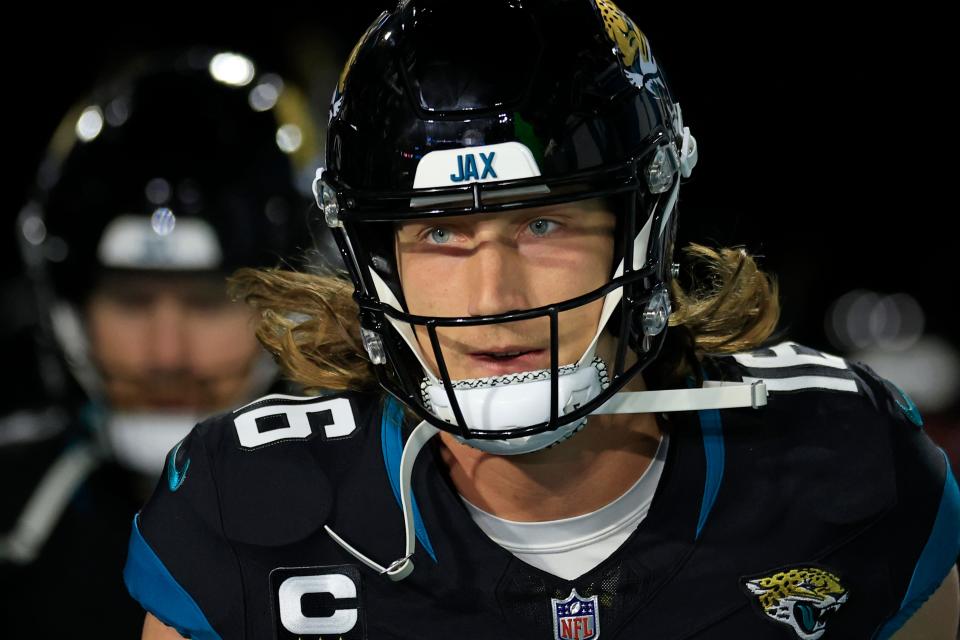 Jacksonville Jaguars quarterback Trevor Lawrence (16) leads his team onto the field before a regular season NFL football matchup Monday, Dec. 4, 2023 at EverBank Stadium in Jacksonville, Fla. The Cincinnati Bengals defeated the Jacksonville Jaguars 34-31 in overtime. [Corey Perrine/Florida Times-Union]