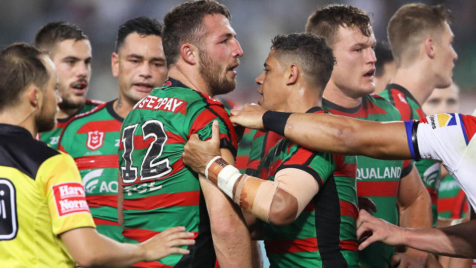 Sam Burgess of the Rabbitohs looks on after the melee. (Photo by Mark Kolbe/Getty Images)