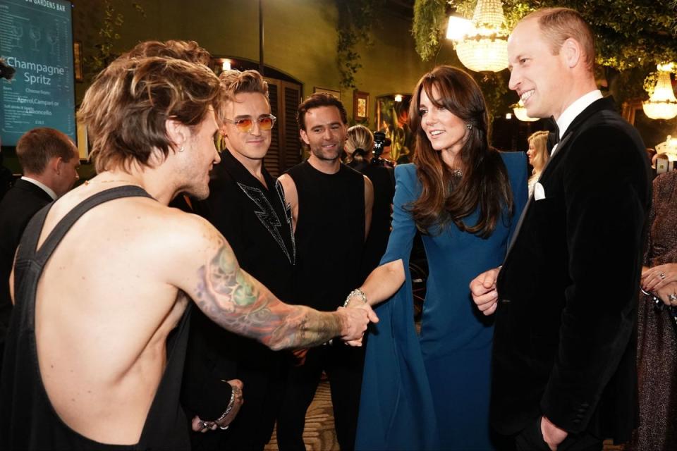 William and Kate meeting members of McFly (PA)