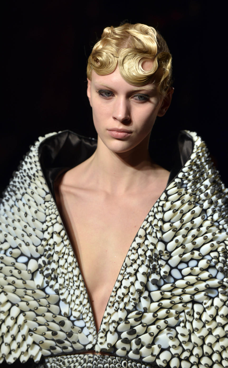 A model wears a creation by Dutch fashion designer Iris van Herpen for her Spring Summer 2013 Haute Couture fashion collection, presented in Paris, Monday, Jan.21, 2013. (AP Photo/Benjamin Girette)