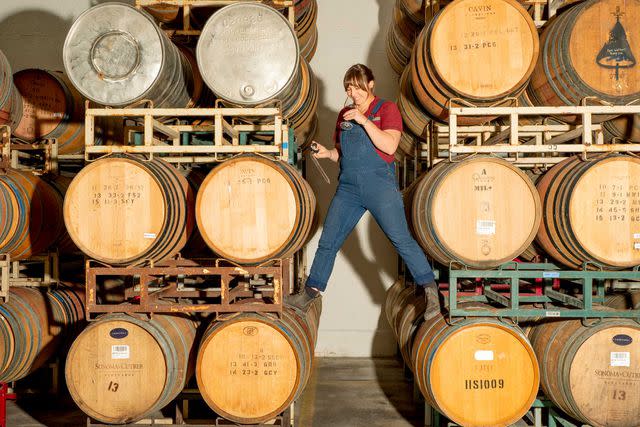 <p>Cayce Clifford</p> Winemaker Megan Bell in the barrel room at Margins Wine, in the Santa Cruz County town of Watsonville.