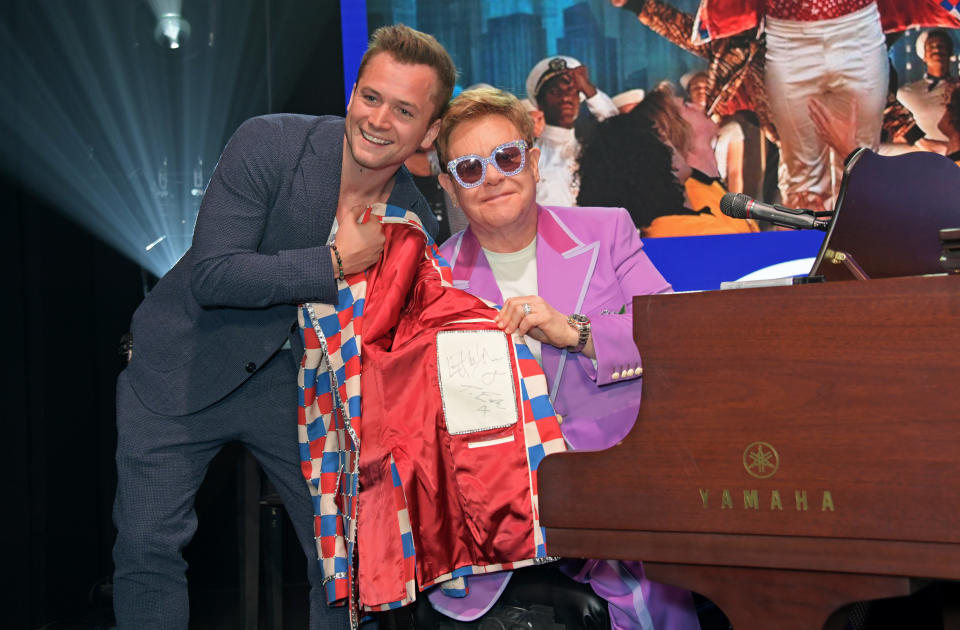 ANTIBES, ENGLAND - JULY 24:   Taron Egerton and Sir Elton John attend the first 