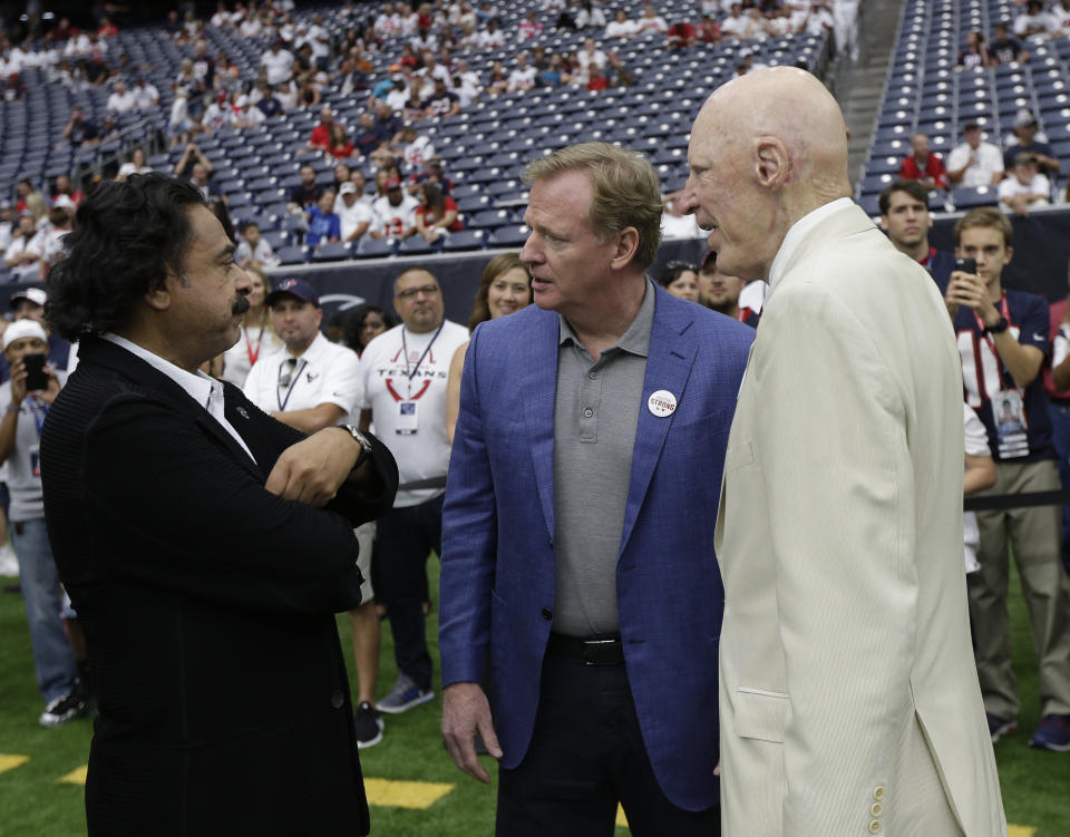 The Jags' Shad Khan (left), talking with NFL commissioner Roger Goodell (middle) and Texans owner Bob McNair, is entering his sixth full season of owning the team. (AP) 